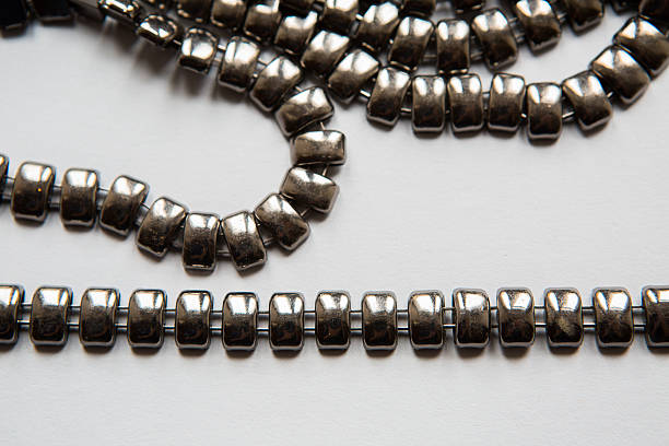 Close-up of stainless steel necklace with intricate details and high-quality craftsmanship